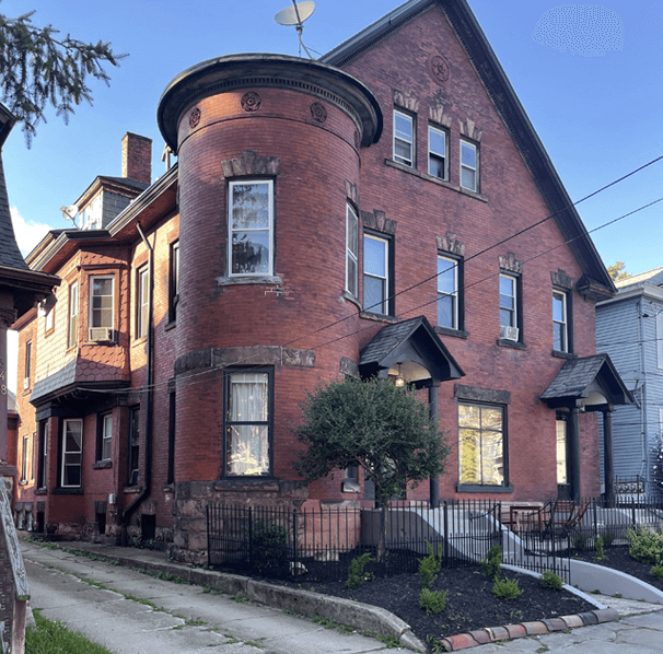 Street with Victorian style brick houses